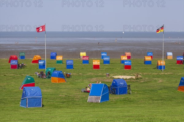 Colourful beach chairs at the green beach at the Outer Elbe