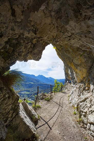 Mountain bikers on the high altitude trail through the Ewige Wand