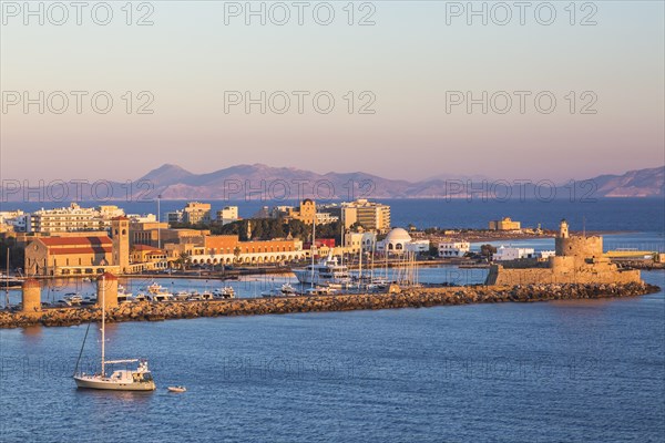 Fort of Saint Nicholas with Mandraki marina at sunrise