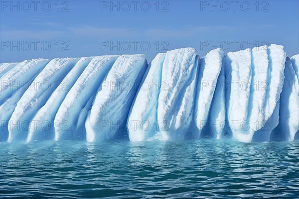 Iceberg drifts through Icefjord