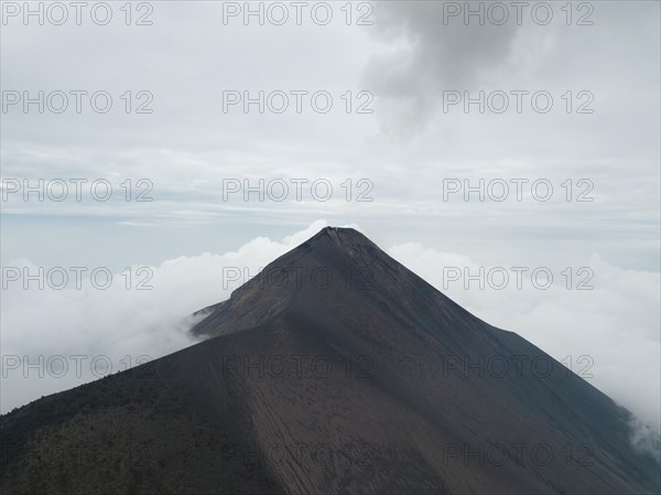 Smoke spitting volcano