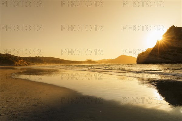 Wharariki Beach at sunset