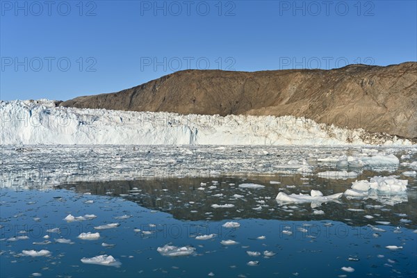 Eqi glacier with drift ice in the foreground