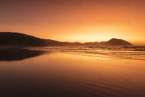 Wharariki Beach at sunset