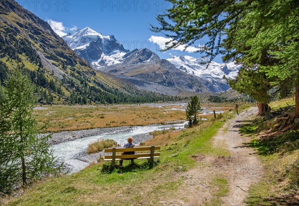 Hiking trail and glacier stream in the Roseg Valley