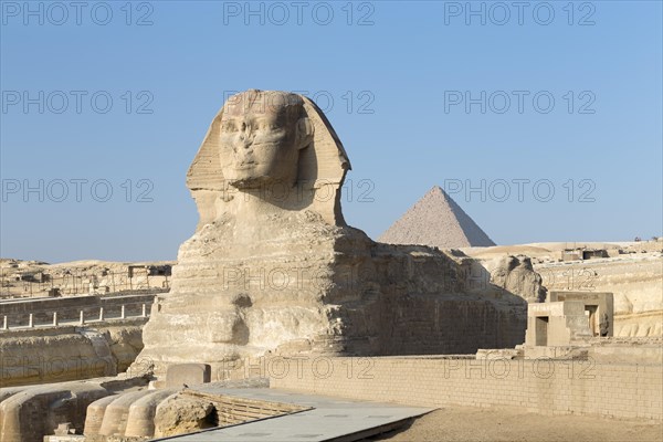 The great Sphinx with the pyramid of Menkaure in the background