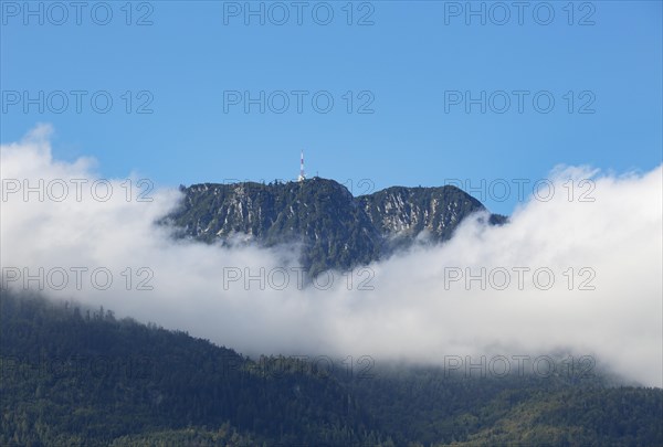 Band of clouds around mountain peak Katrin