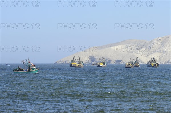 Bay with anchored fishing boats