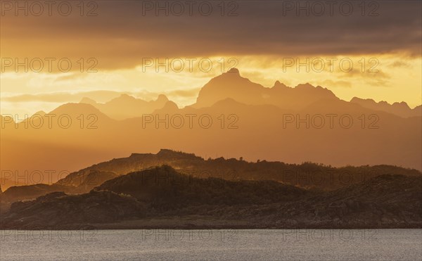 Atmospheric sunset over a high mountain range