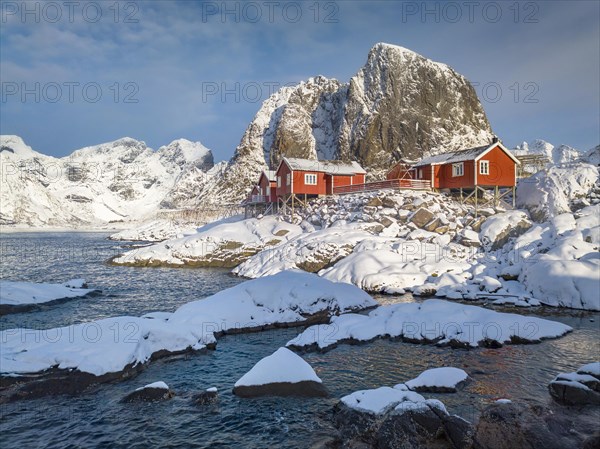 Rorbuer fishermen's cabins on the snowy fjord