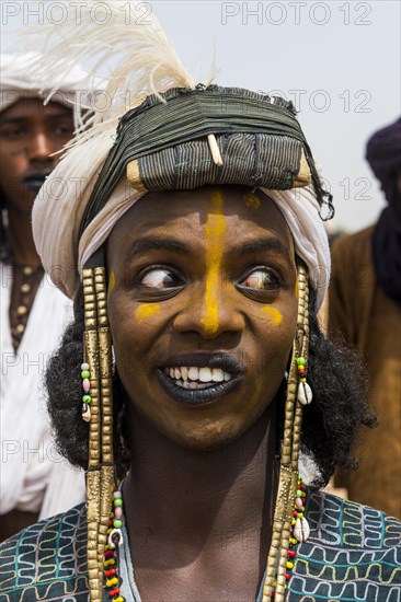 Wodaabe-Bororo man with face painted at the annual Gerewol festival