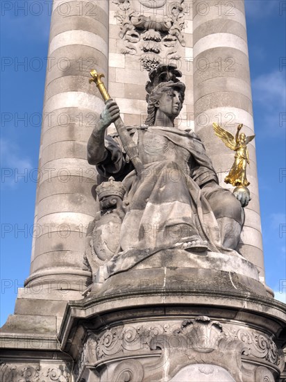 Column with a statue of the bridge Pont Alexandre III