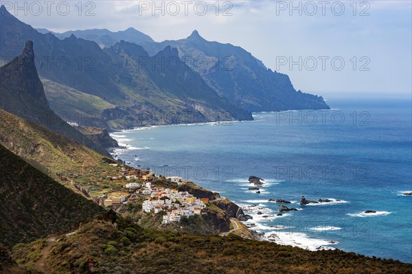 Coastal road with cliffs near the village of Almaciga