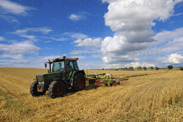 Tractor working in a cereal field