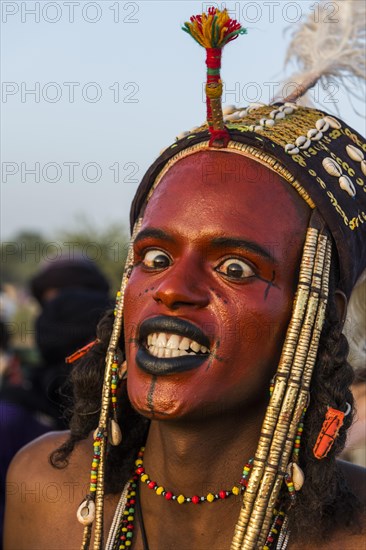 Wodaabe-Bororo man with face painted at the annual Gerewol festival