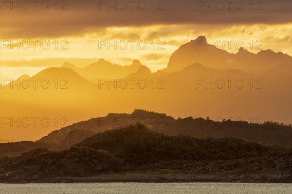 Atmospheric sunset over a high mountain range