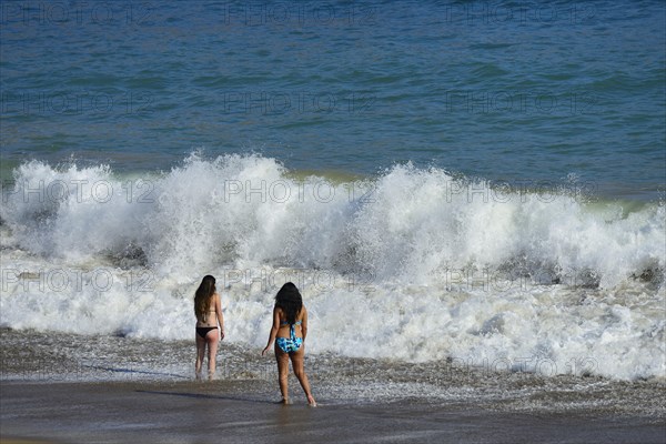 Bathers at the beach of Quebrada de la Huaca