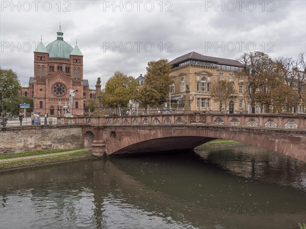 Bridge over the Canal du Faux Rempart and Jung Saint Peter Catholic Church