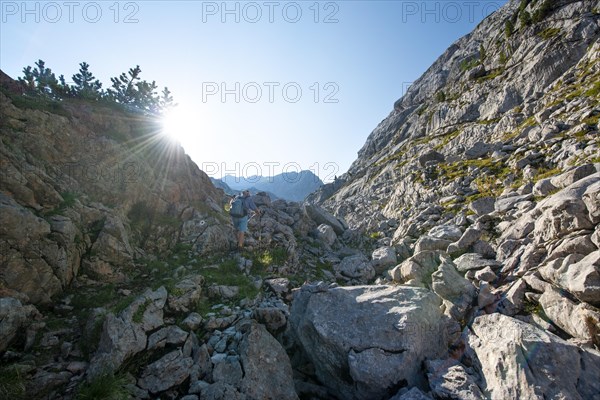 Hiker in karst landscape