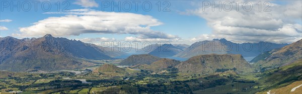 View of the surrounding mountains with The Remarkables mountain range and Lake Wakatipu