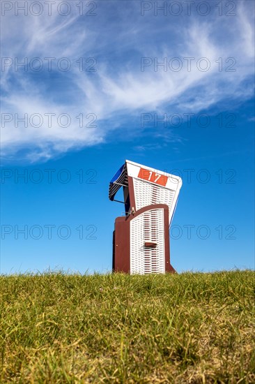 Roofed wicker beach chair on Norderney