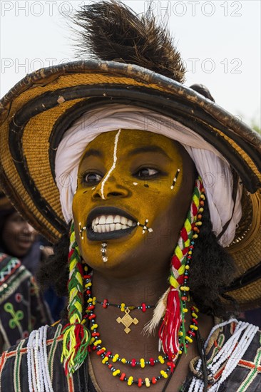 Wodaabe-Bororo man with face painted at the annual Gerewol festival