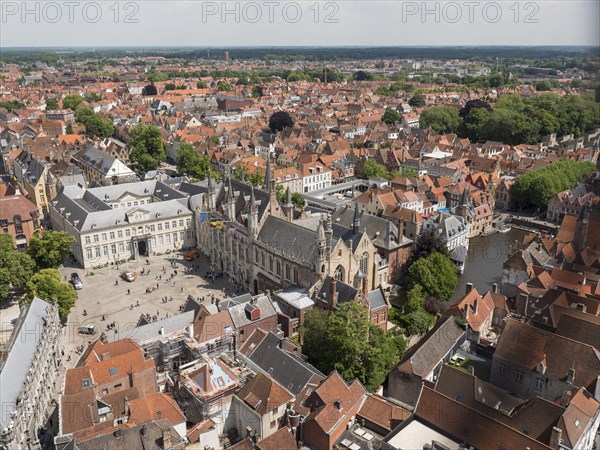 City view from the Belfort of Bruges Tower towards the Holy Blood Basilica and City Hall