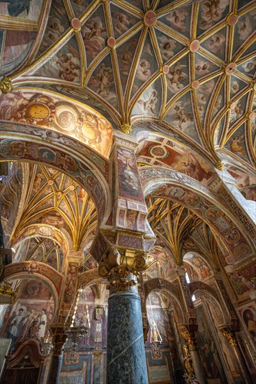 Wall and ceiling paintings with angels in the side chapel