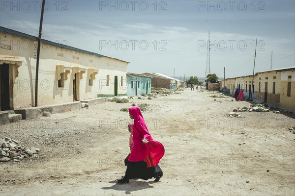 Girls crossing the road