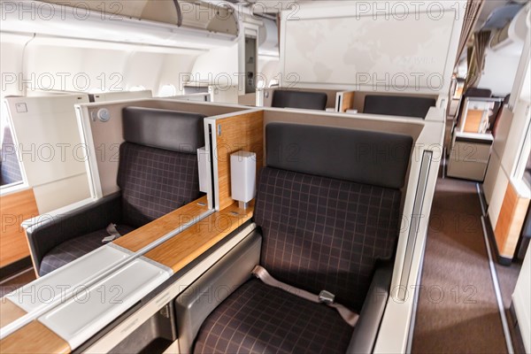 Business Class cabin of an Airbus A340-300 aircraft of Swiss at Zurich Airport