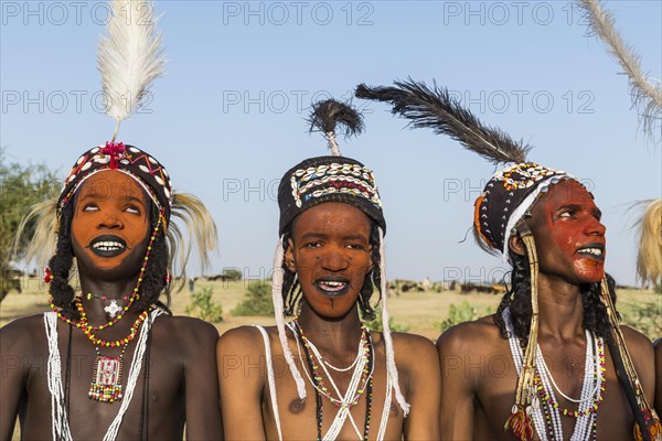 Wodaabe-Bororo men with faces painted at the annual Gerewol festival