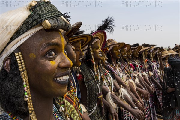 Wodaabe-Bororo men with faces painted at the annual Gerewol festival