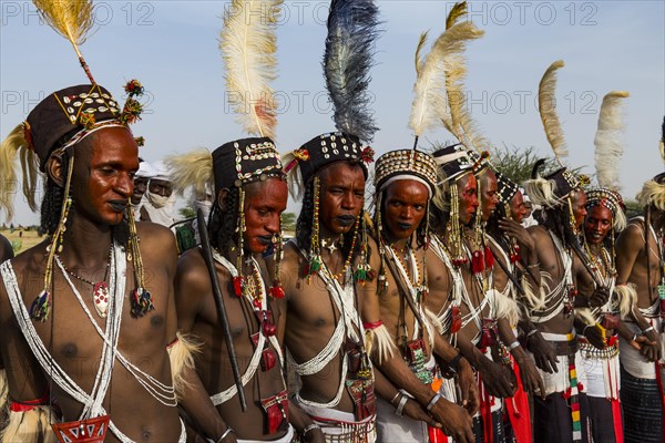 Wodaabe-Bororo men with faces painted at the annual Gerewol festival