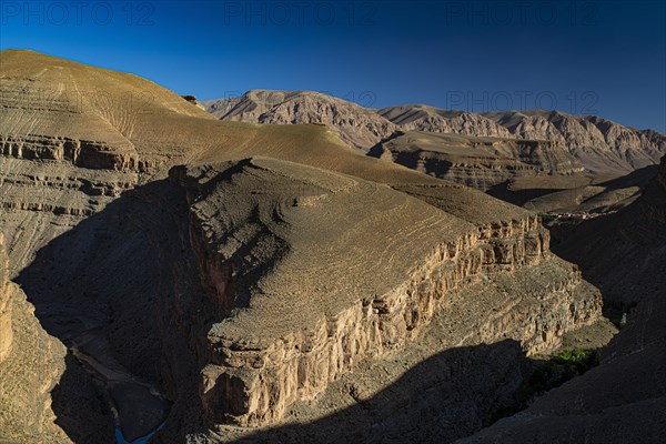 View of canon-like erosion landscapes in the upper Dade Valley near Msemrir