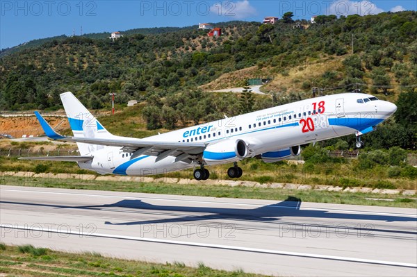 A Boeing 737-800 of Enter Air with the registration SP-ENX and the special painting 100 years of independence at Skiathos Airport