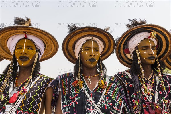 Wodaabe-Bororo men with faces painted at the annual Gerewol festival