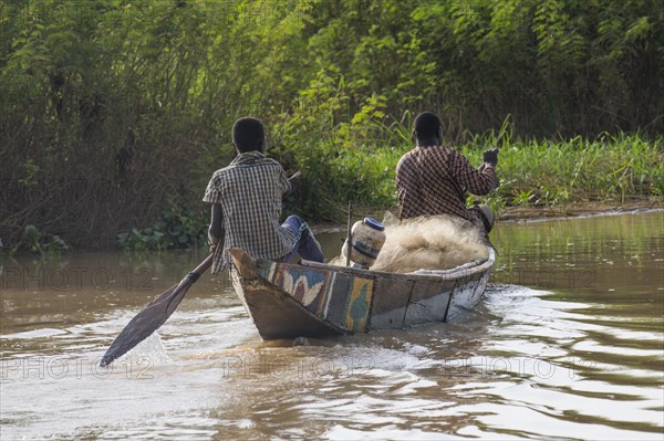 Fishermen in their canoe