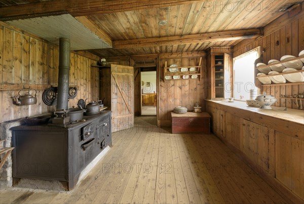 Interior view of historical kitchen with old oven