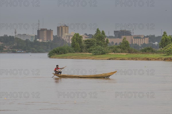Man in canoe on the Niger river