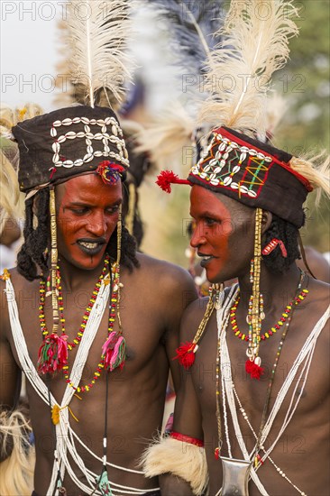 Wodaabe-Bororo men with faces painted at the annual Gerewol festival