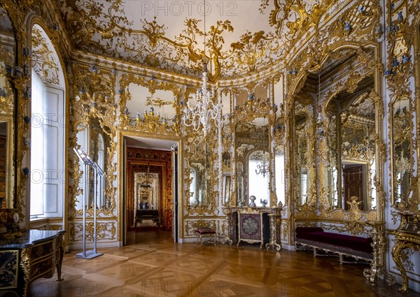 Artfully decorated mirror cabinet