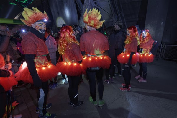 Costumed runners waiting for the start