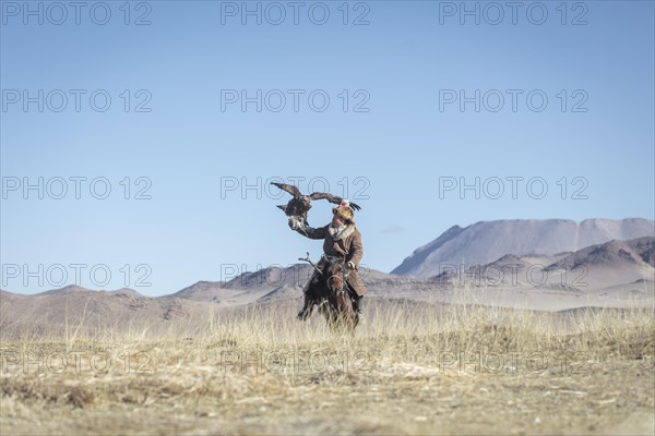 Spai Bashakan trains his female eagle