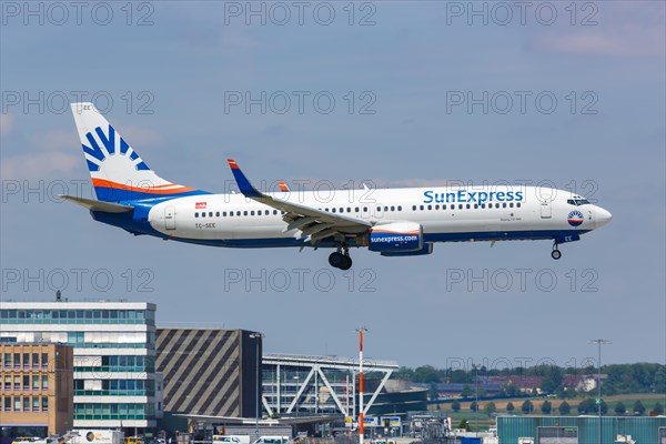 A Boeing 737-800 of SunExpress with the registration TC-SEE at Stuttgart Airport