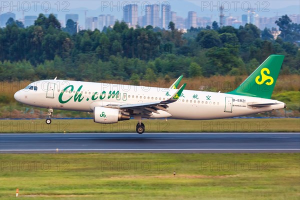 An Airbus A320 aircraft of Spring Airlines with registration number B-6821 at Chengdu Airport
