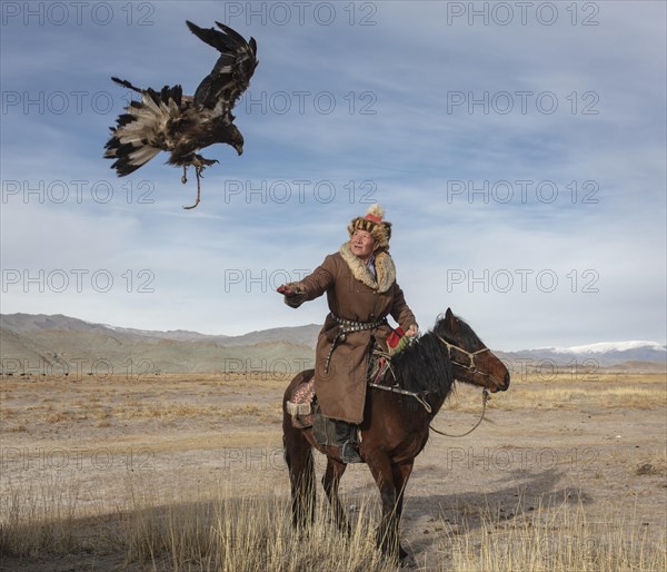 Spai Bashakan trains his female eagle