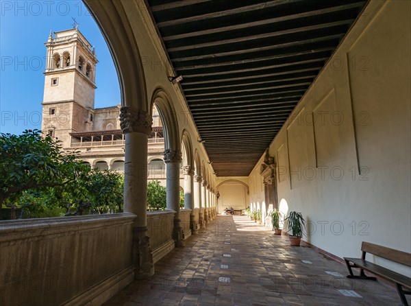 View of the church tower through arcades