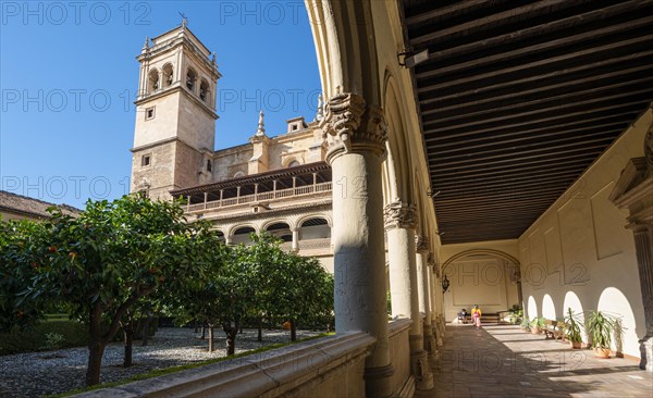 View of the church tower through arcades