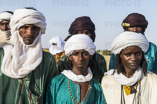 Young men arriving for the Gerewol festival