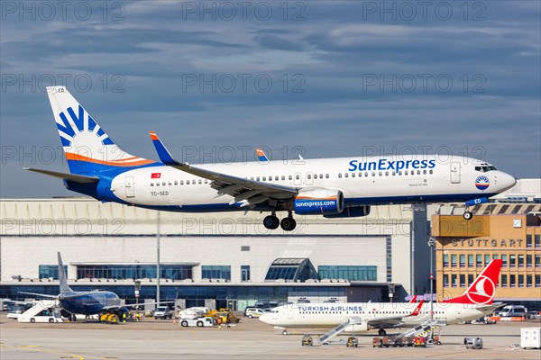 A Boeing 737-800 of SunExpress with the registration TC-SED lands at Stuttgart Airport